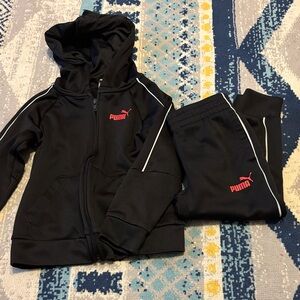Puma Black Tracksuit with Red Logo. New condition. Full zip-up jacket. Sz.4T.